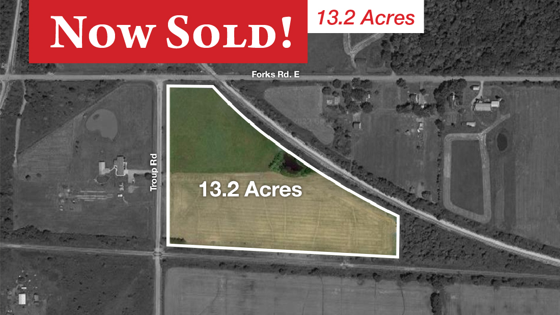 now sold banner on vacant land for sale on troup rd port colborne by ruzycki real estate