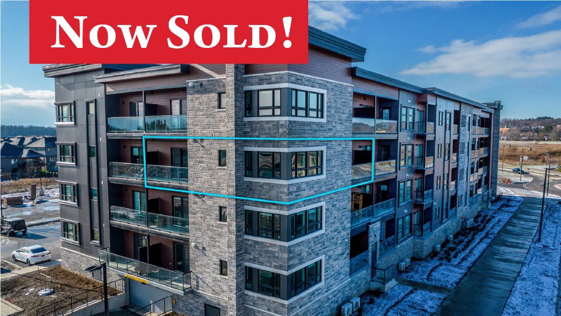 now sold banner on unit 309 in condo building at 120 summersides blvd fonthill