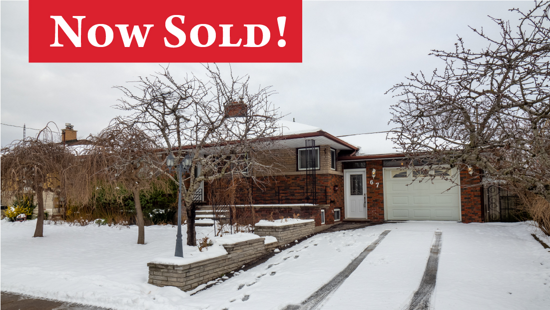 Another Sold banner on brick bungalow on Clarke Street in Port Colborne