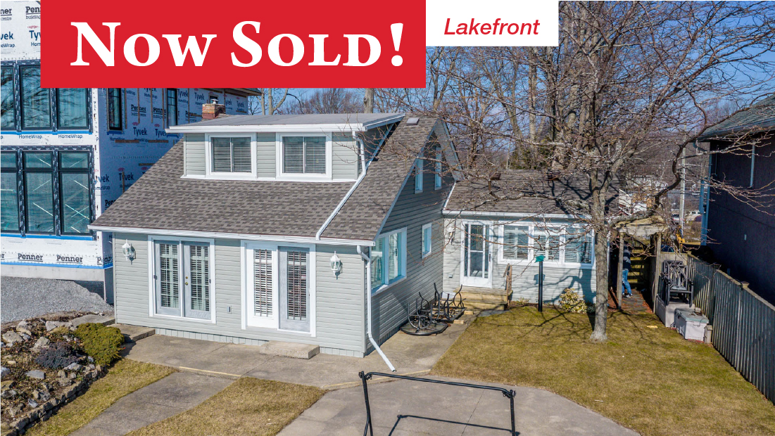 now sold banner with lakefront flag on 10571 lakeshore rd wainfleet