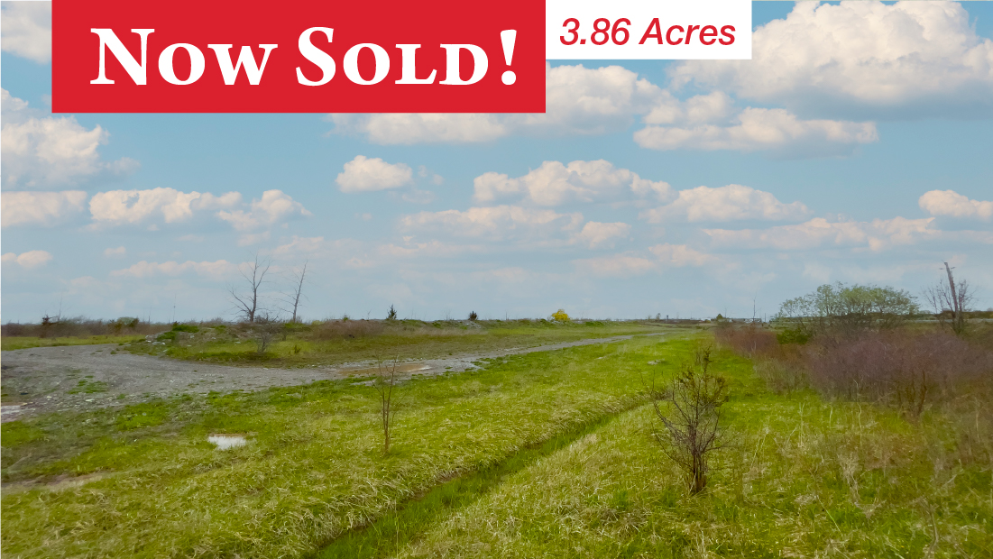 now sold banner with 3.86 acre flag on w/s colborne st welland sold by frank ruzycki real estate