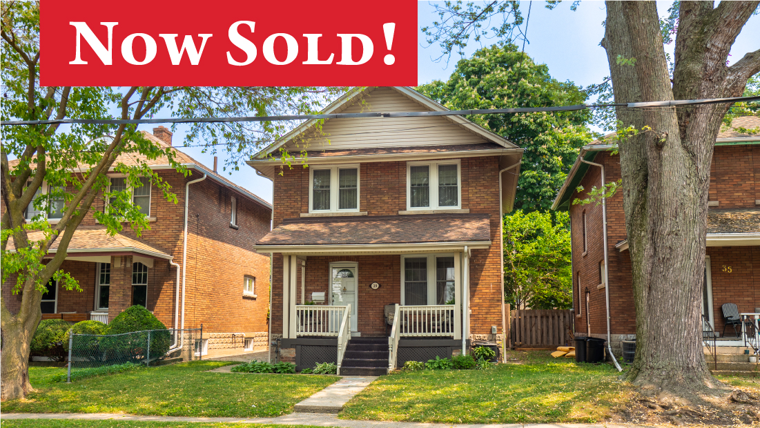 Now Sold banner on brick 2 storey home for sale at 39 Fielden Avenue Port Colborne