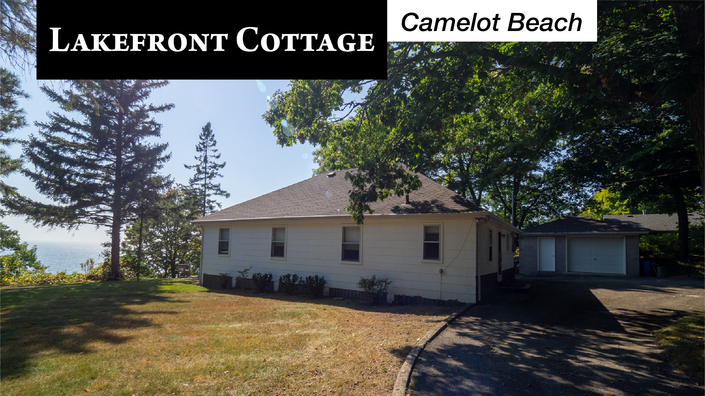 lakefront cottage banner with camelot beach flag on 10209 camelot dr wainfleet for sale by ruzycki real estate