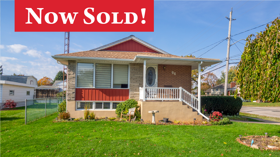 now sold flag on image of front exterior of 94 homewood ave port colborne sold by frank ruzycki real estate