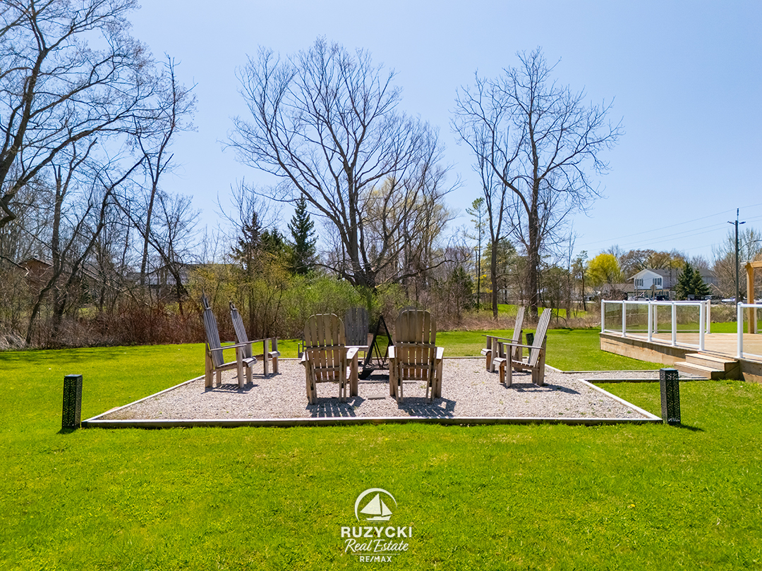 1561-north-shore-dr-lowbanks_60 backyard firepit of 1561 north shore dr lowbanks