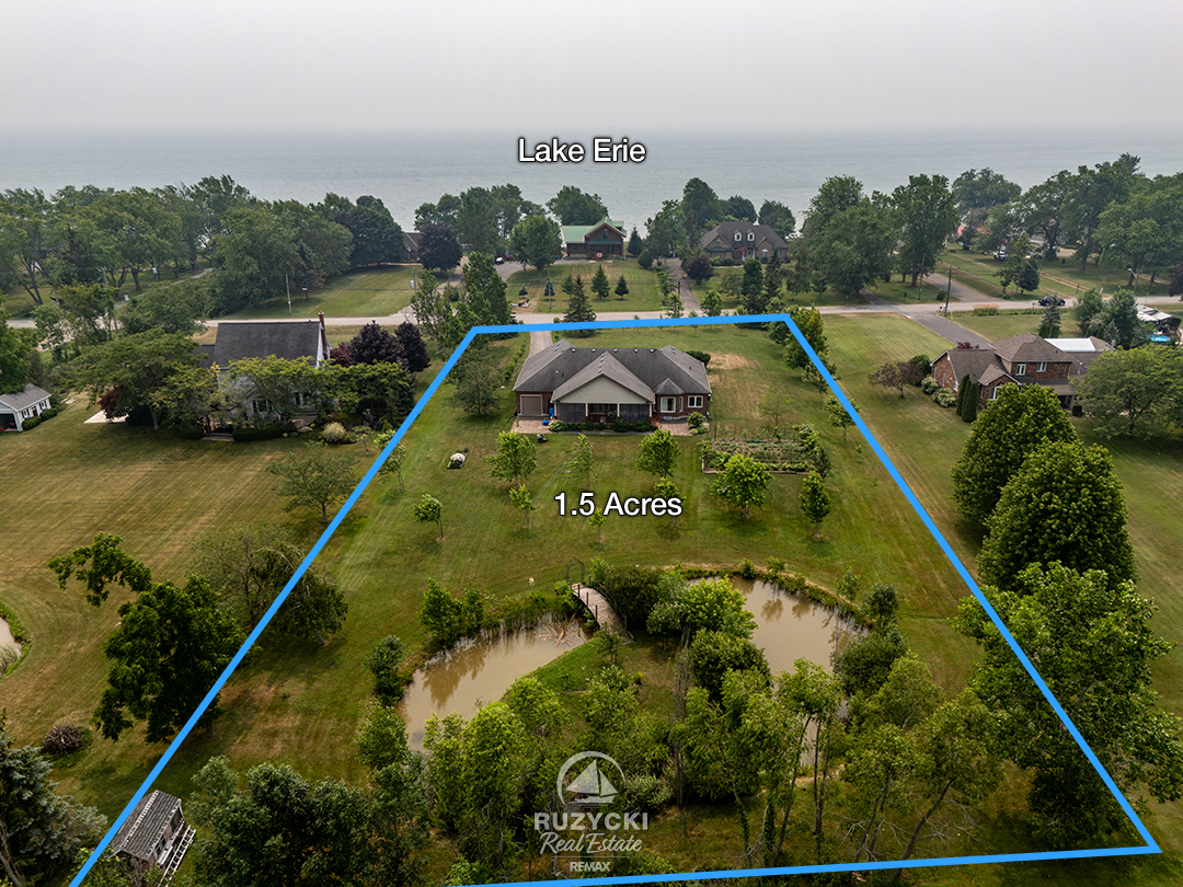 11004-lakeshore-rd-wainfleet_72 aerial view with approximate lot outlines of 11004 lakeshore rd wainfleet showing 1.5 acres and lake erie across the road