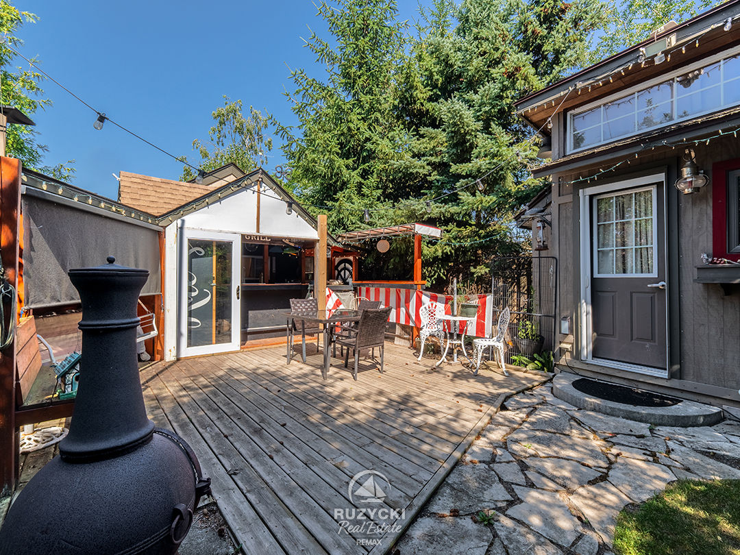11679-belleview-beach-rd-wainfleet_09 backyard deck with cookhouse and bunkhouse of 11679 belleview beach rd wainfleet