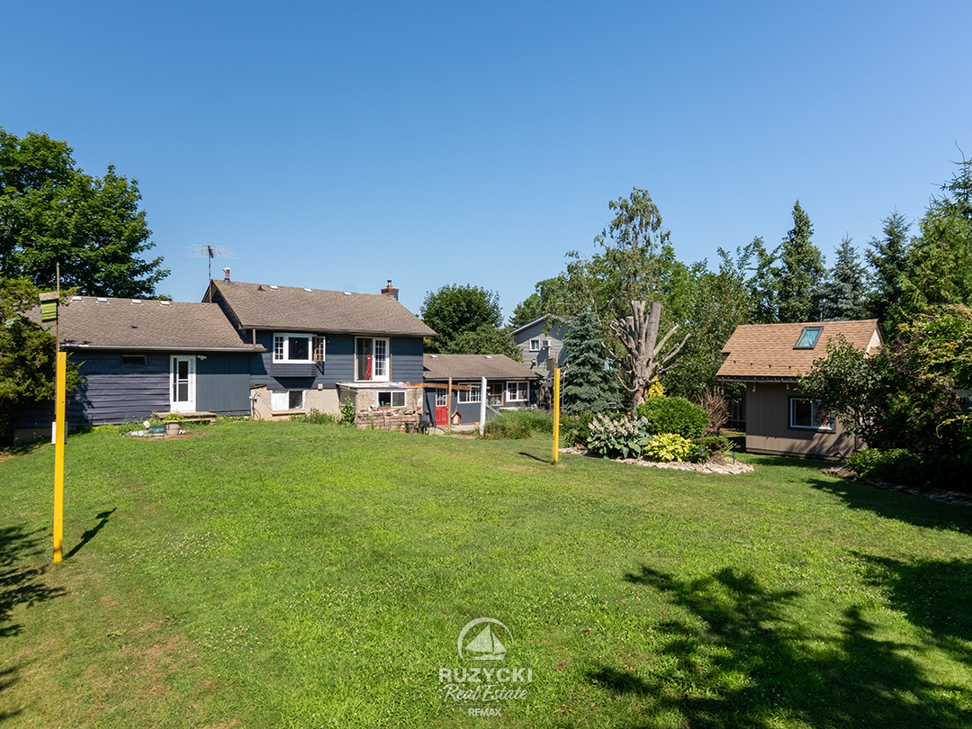 11679-belleview-beach-rd-wainfleet_14 rear exterior and backyard of 11679 belleview beach rd wainfleet