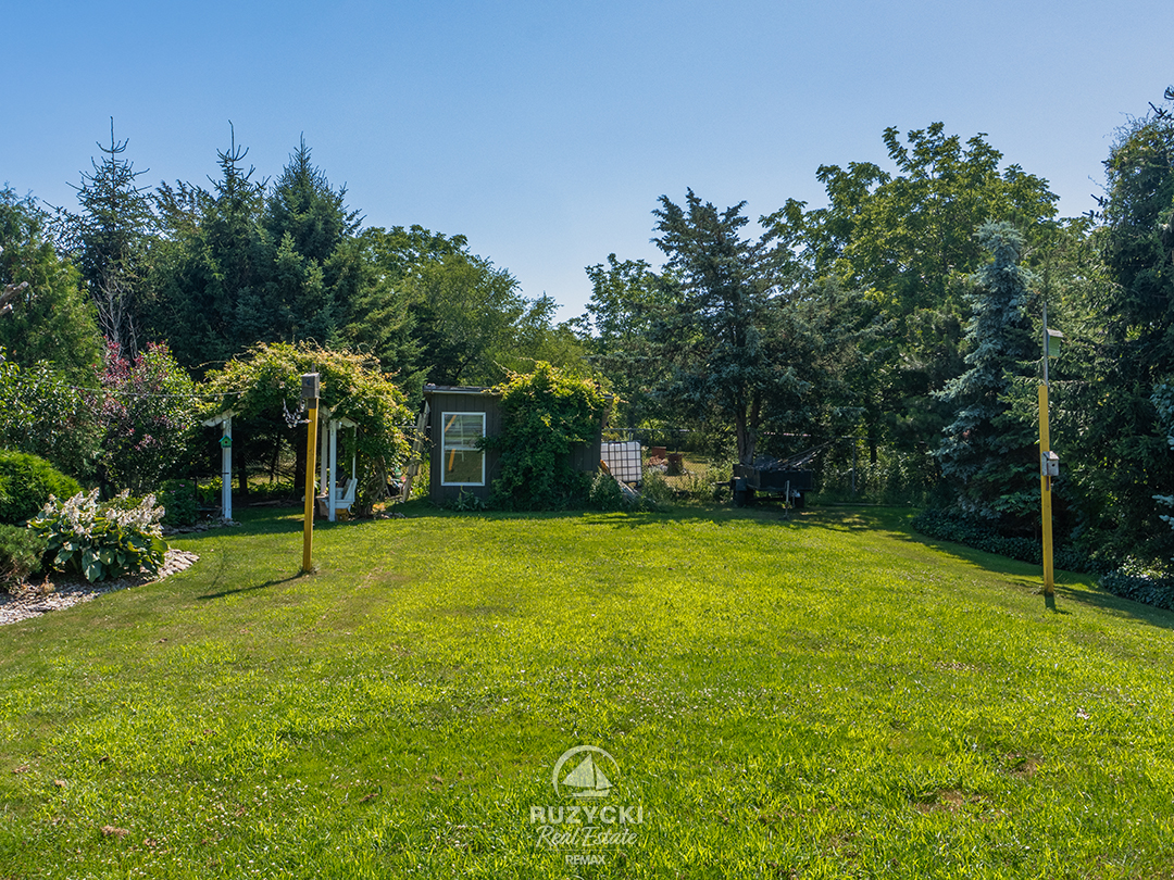 11679-belleview-beach-rd-wainfleet_18 backyard with garden shed of 11679 belleview beach rd wainfleet