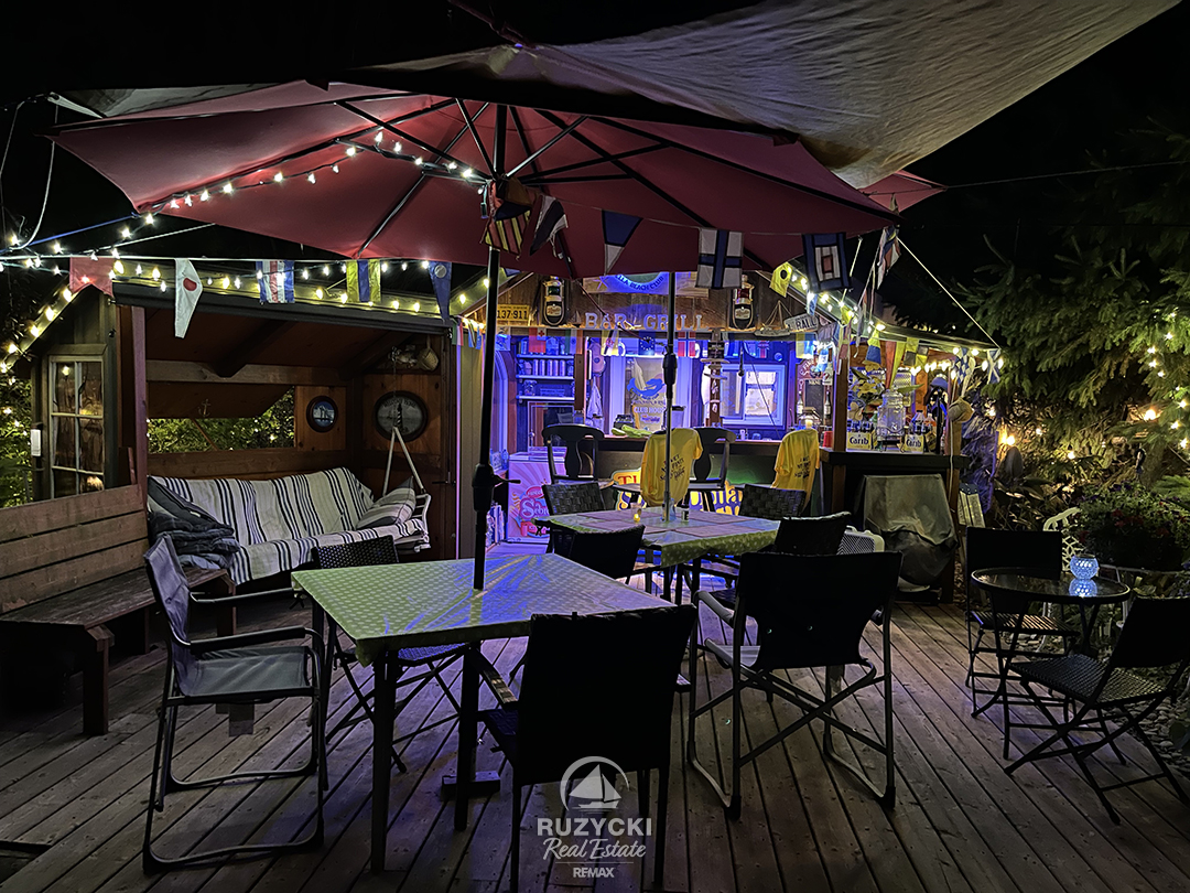 11679-belleview-beach-rd-wainfleet_82 deck of backyard cookhouse with bar at 11679 belleview beach rd wainfleet