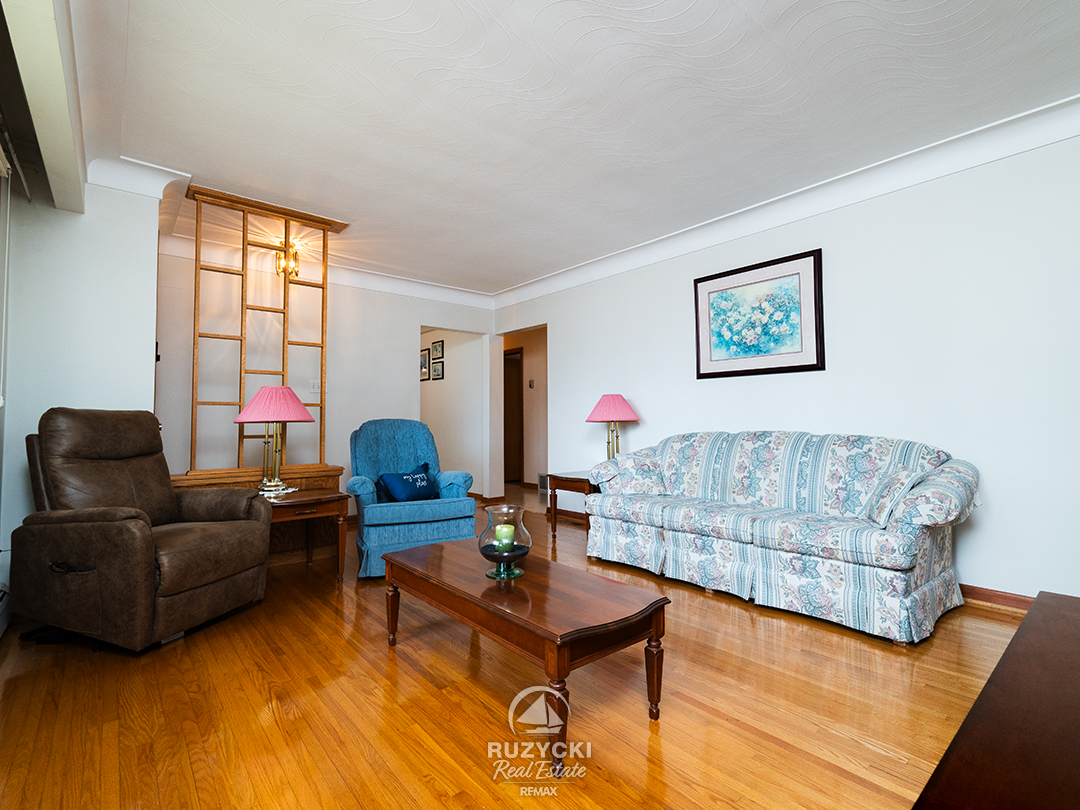 167-wellington-st-port-colborne_10 Living Room with wood floors at brick bungalow for sale at 167 Wellington Street Port Colborne