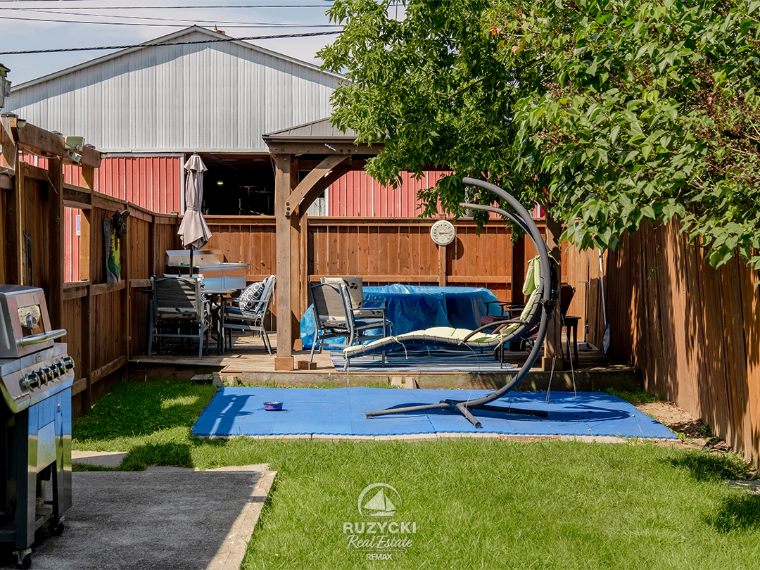 66-neff-st-port-colborne_65 fenced backyard with gazebo of 66 neff street port colborne