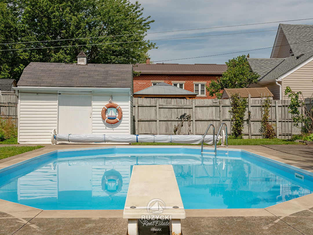 632-king-street-port-colborne_29 fenced backyard with inground pool