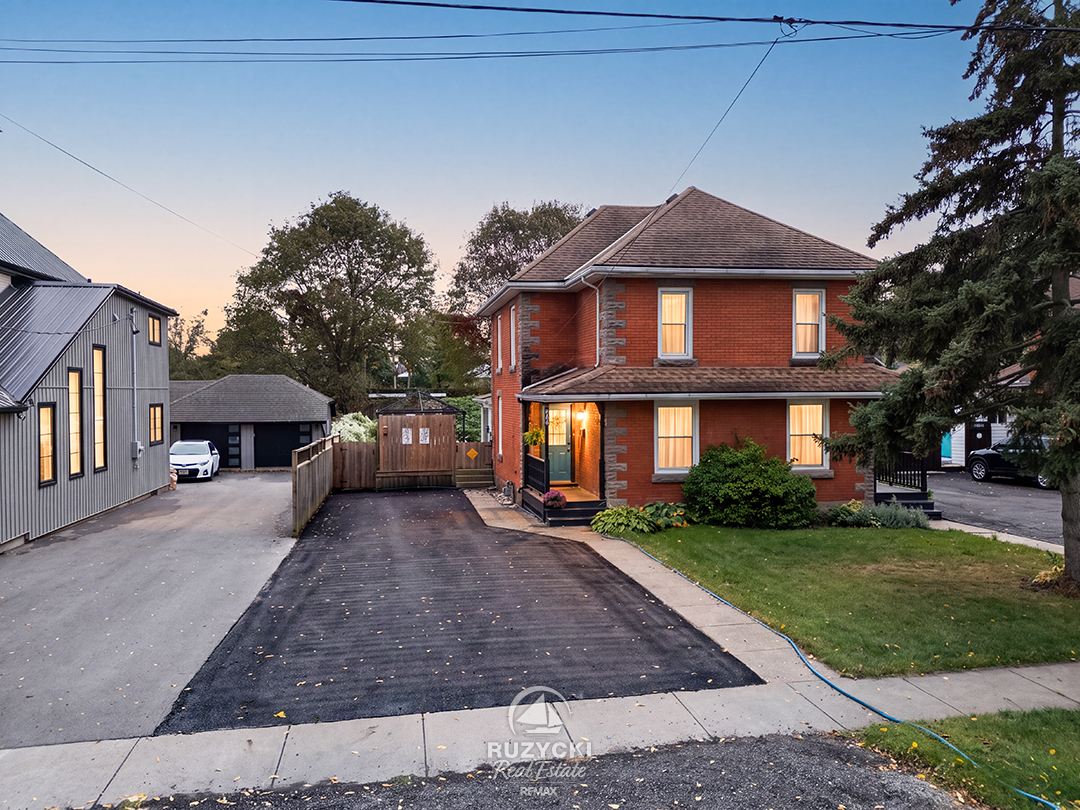 310-clarence-street-port-colborne_13 front exterior of home at twilight